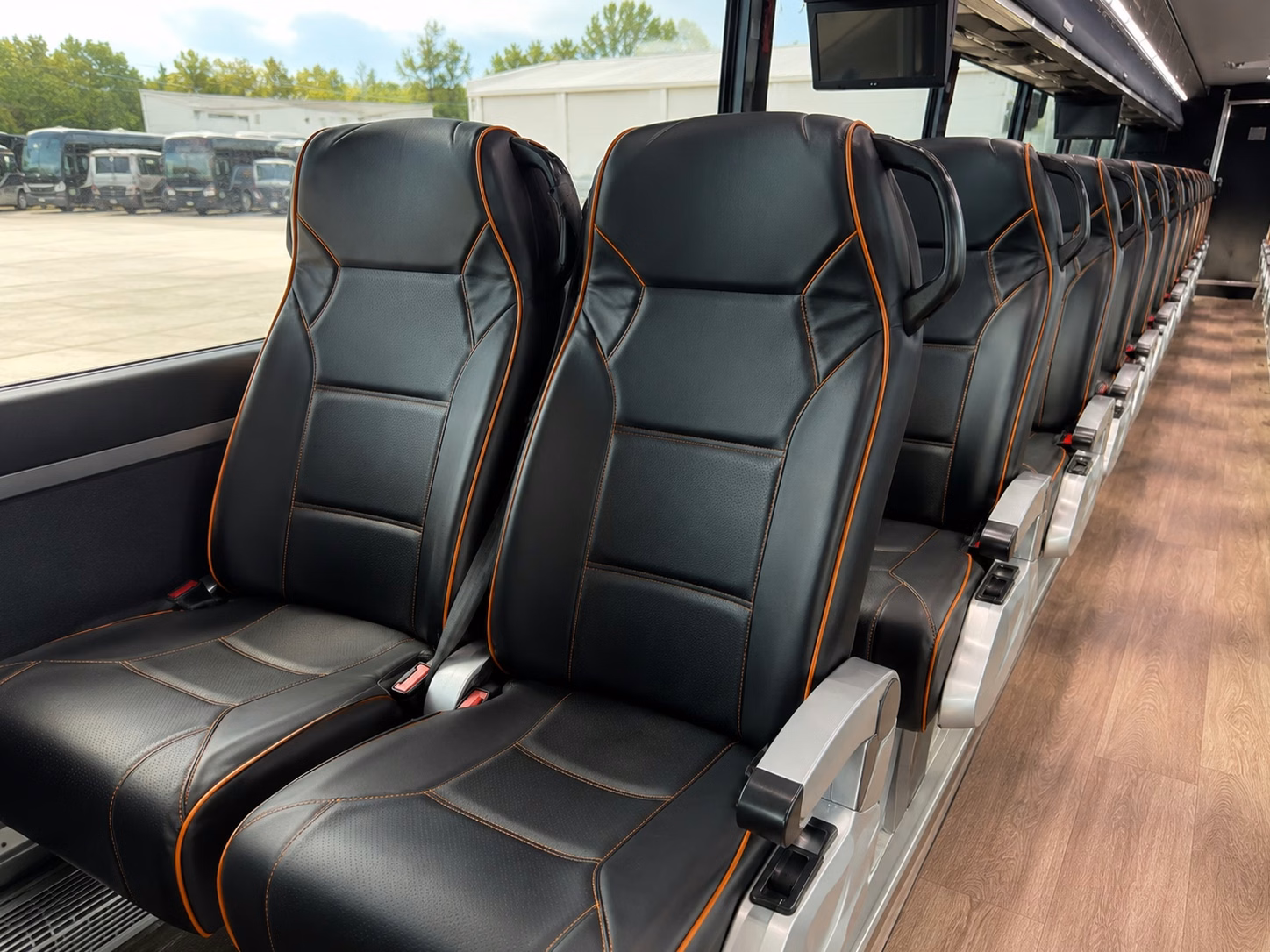 shuttles for uncg spartans and guilford college quakers athletic events